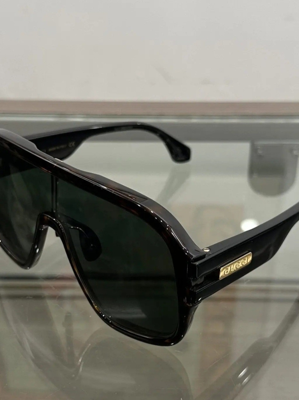 Gucci Oversized Black Sunglasses with Gold Logo